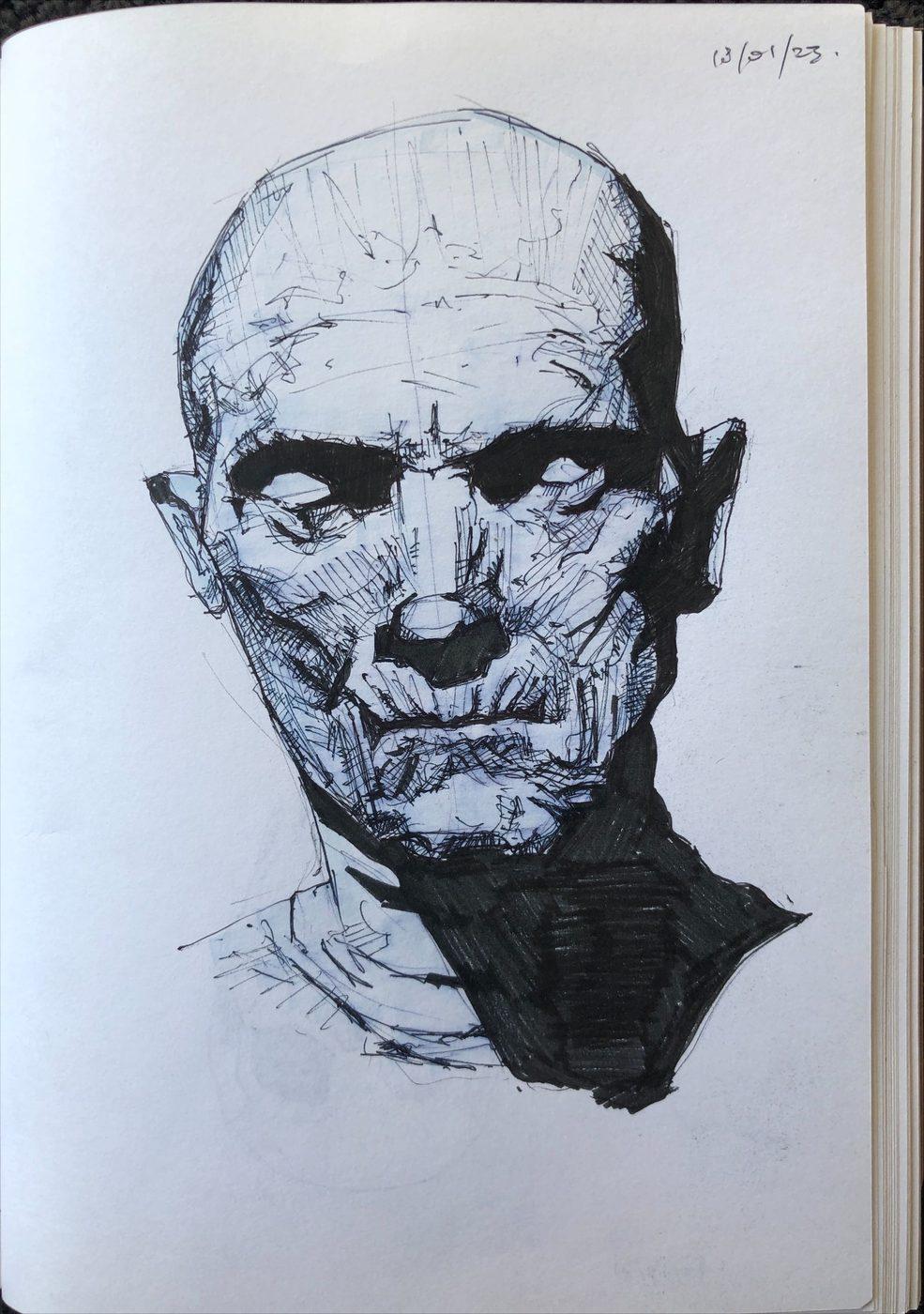 Sketchbook ink study of a bald head lit from one side