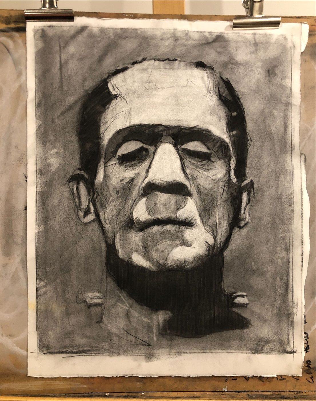 Charcoal portrait of Frankenstein's monster clipped to an easel